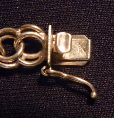 Identifying maker 's mark BB on Charm Bracelet.