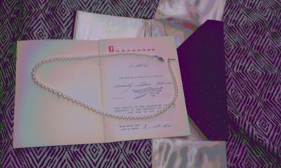 this is just a picture of the little book and of the whole necklace the pearls came with