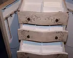 white jewelry armoire top drawers open