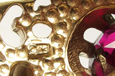 Mens Gold Ring with a C in a circle and a sun star