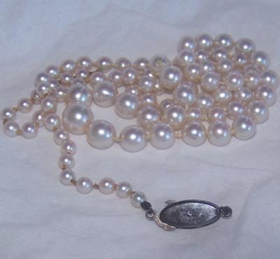 Who made these pearls and what type of pearl are they called?