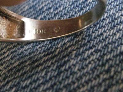 Inside of Ring... Hallmark T(in circle)